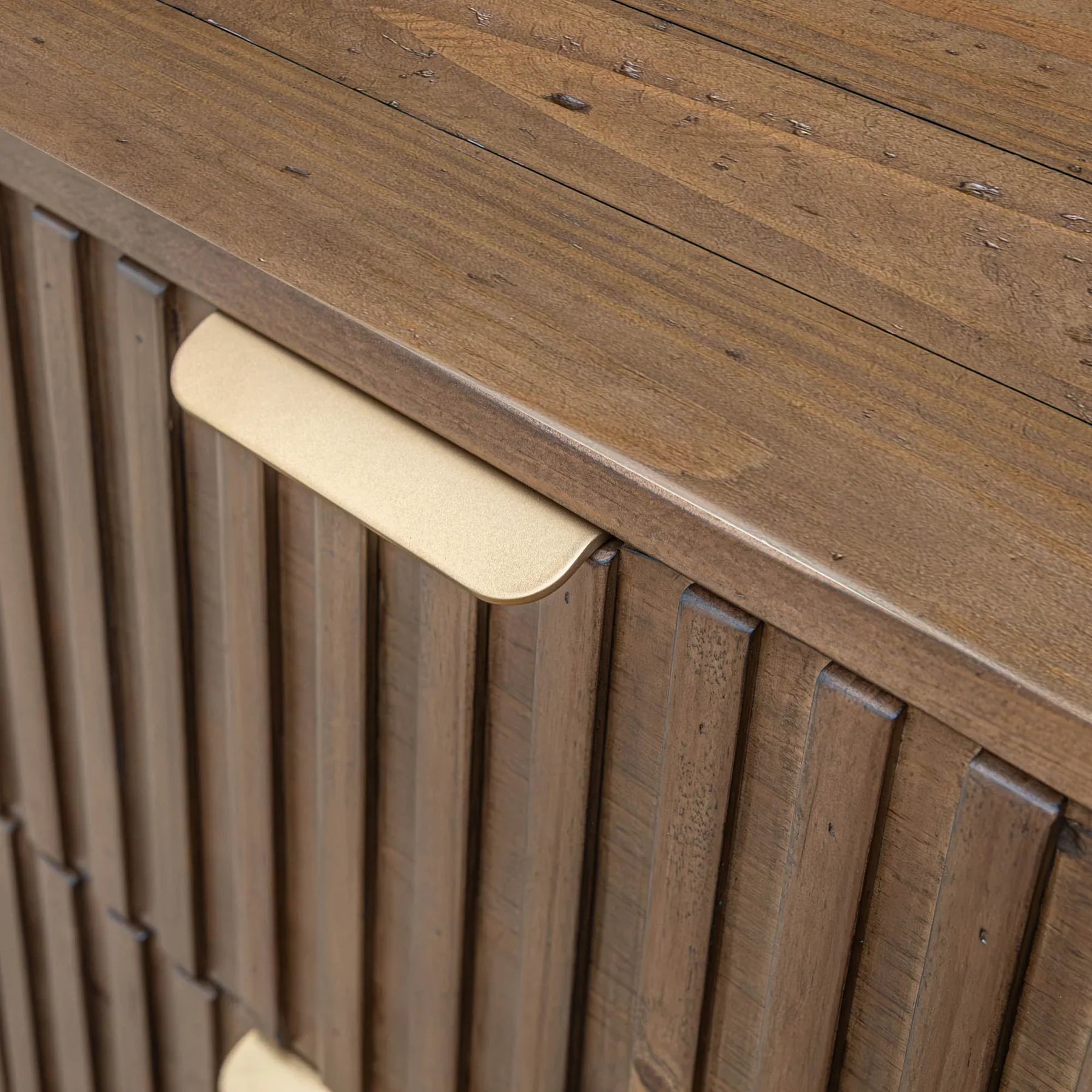 Front view of the Britanica 2-drawer nightstand featuring a driftwood finish and unique vertical wood slat drawer fronts