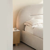 Detailed shot of the lower frame highlighting the cylindrical minimalist legs and secure base support