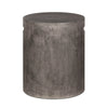 Straight-on profile shot emphasizing the clean vertical lines and smooth architectural finish of the concrete drum table