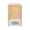 Side profile view emphasizing the slim vertical silhouette and the precision-tapered leg design