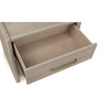 High-angle close-up of the open top drawer highlighting the high-quality wood joinery and uniform chai finish