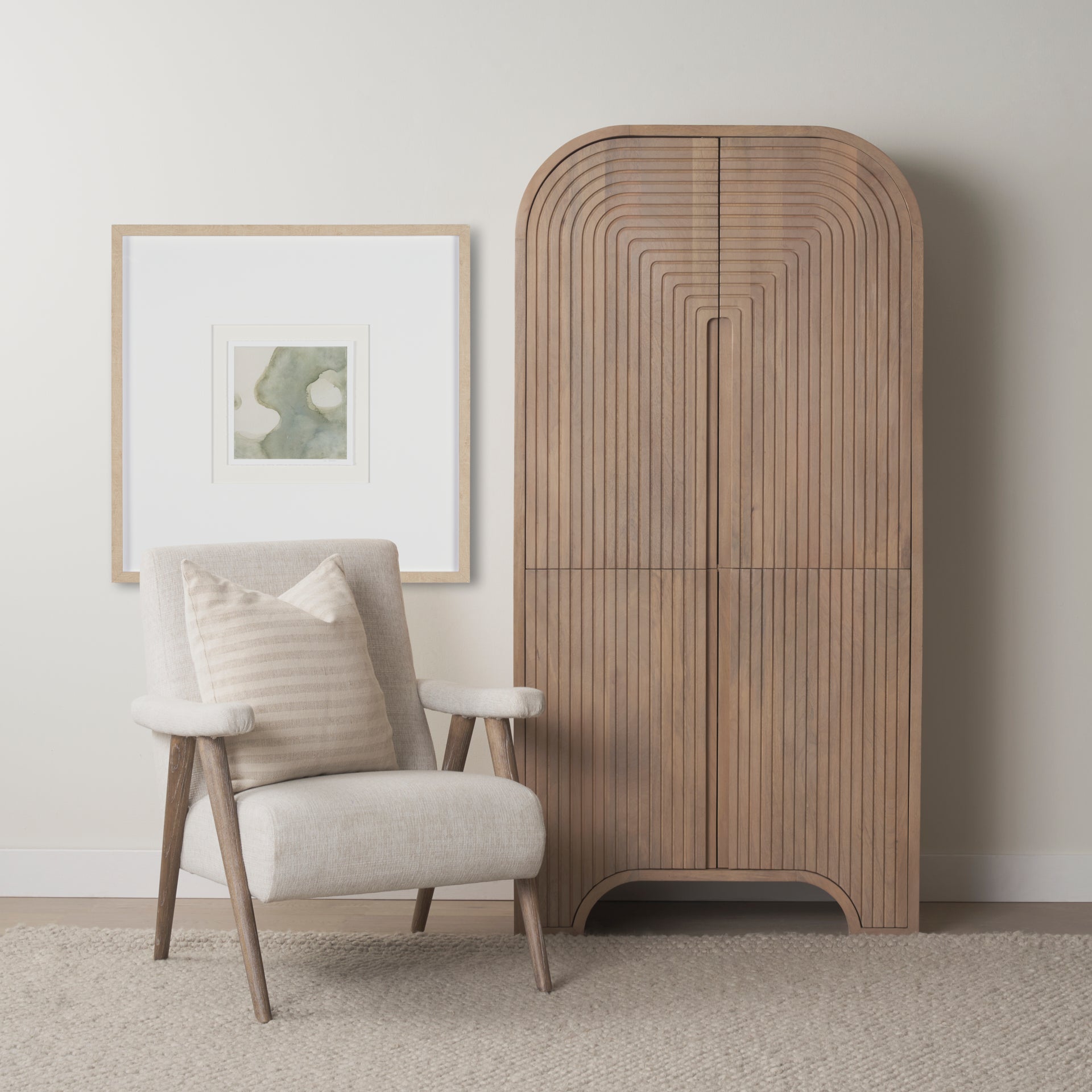 Front view of the Sorina curio cabinet featuring a light brown wood finish and a striking reverse fluted arched design