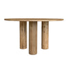Straight-on front view highlighting the architectural triple-leg base and the clean circular tabletop of the Jasper dining table