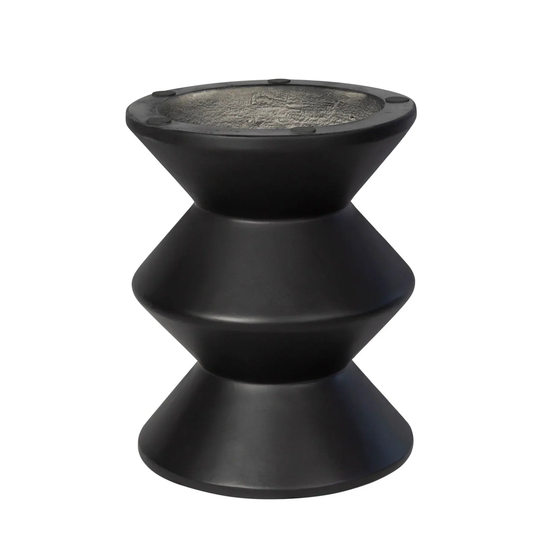 Three-quarter view of the concrete inverted side table featuring a matte black finish and a bold three-tier geometric zig-zag silhouette