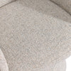 Macro shot of the upper backrest showcasing the soft cream textured weave