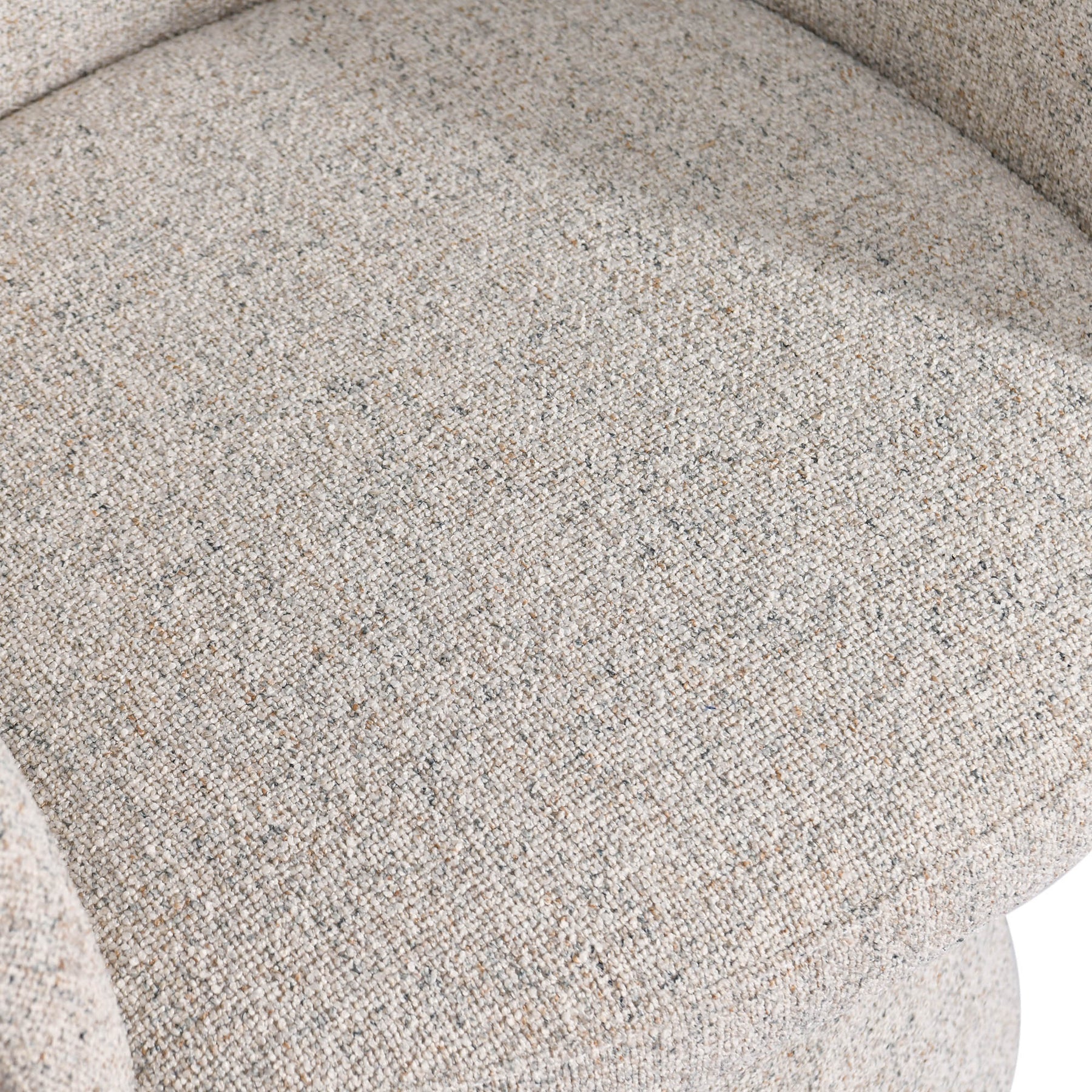 Macro shot of the upper backrest showcasing the soft cream textured weave