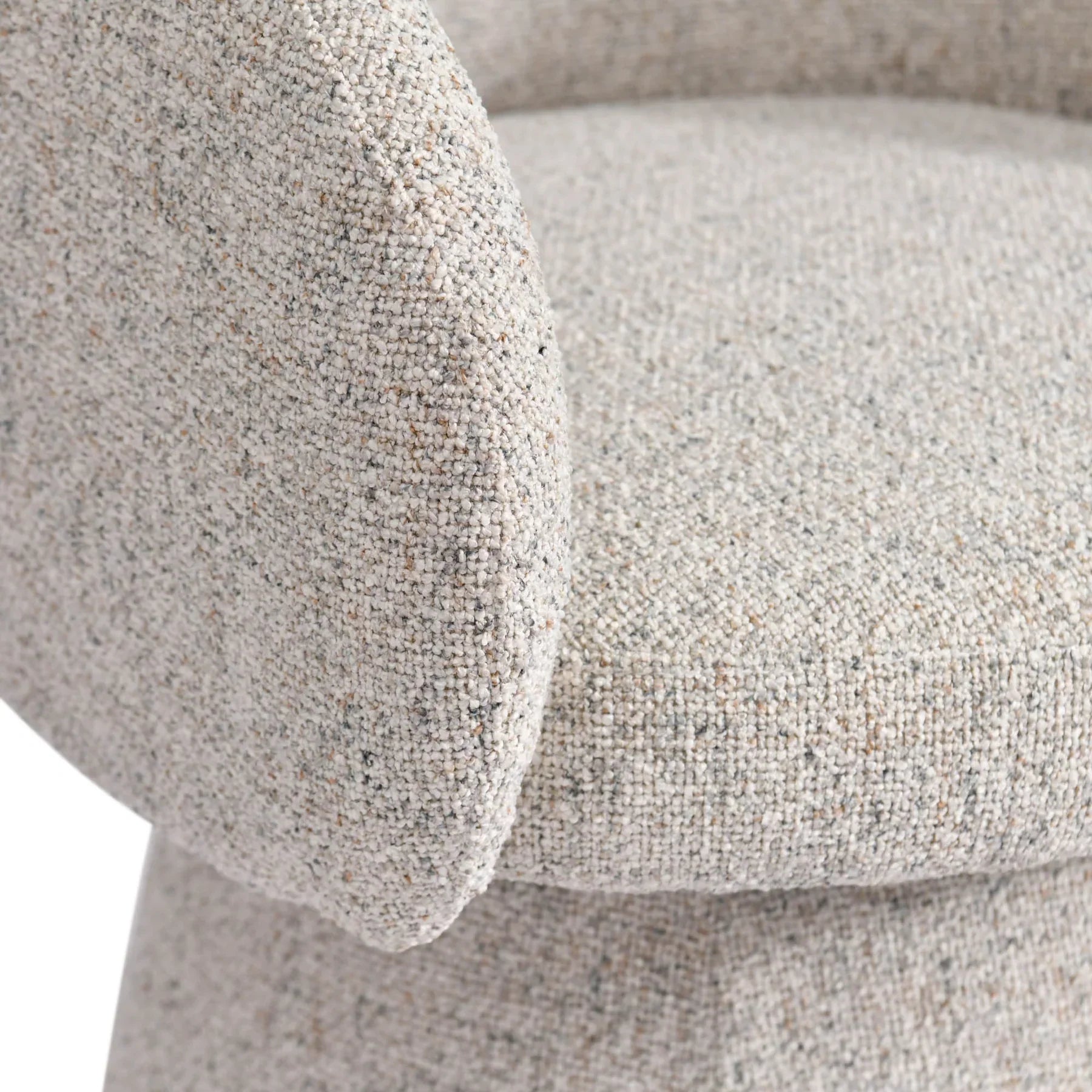 Detailed view of the front seat cushion and the precision stitching on the cream fabric