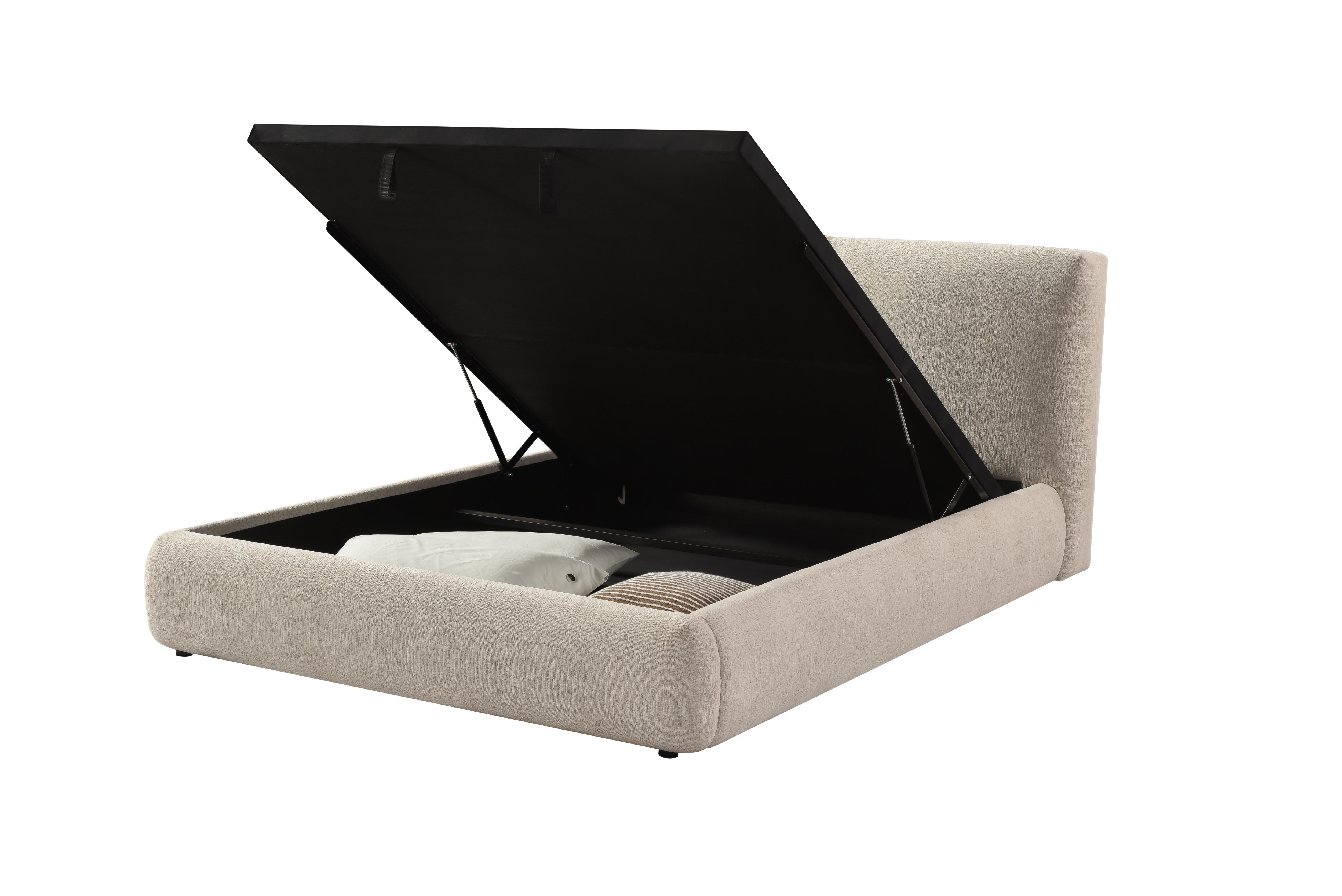Front view of the Drom upholstered storage bed featuring a low-profile cream bouclé frame and a unique split-panel cushioned headboard