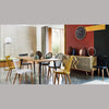 Wide-angle lifestyle shot featuring the sideboard as part of a complete dining room set with a matching wood table