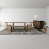 Wide-angle lifestyle shot featuring the Dallas bench paired with a matching wood dining table and wishbone-style chairs
