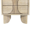 Low-angle detail shot highlighting the seamless transition between the nightstand body and sculptural legs