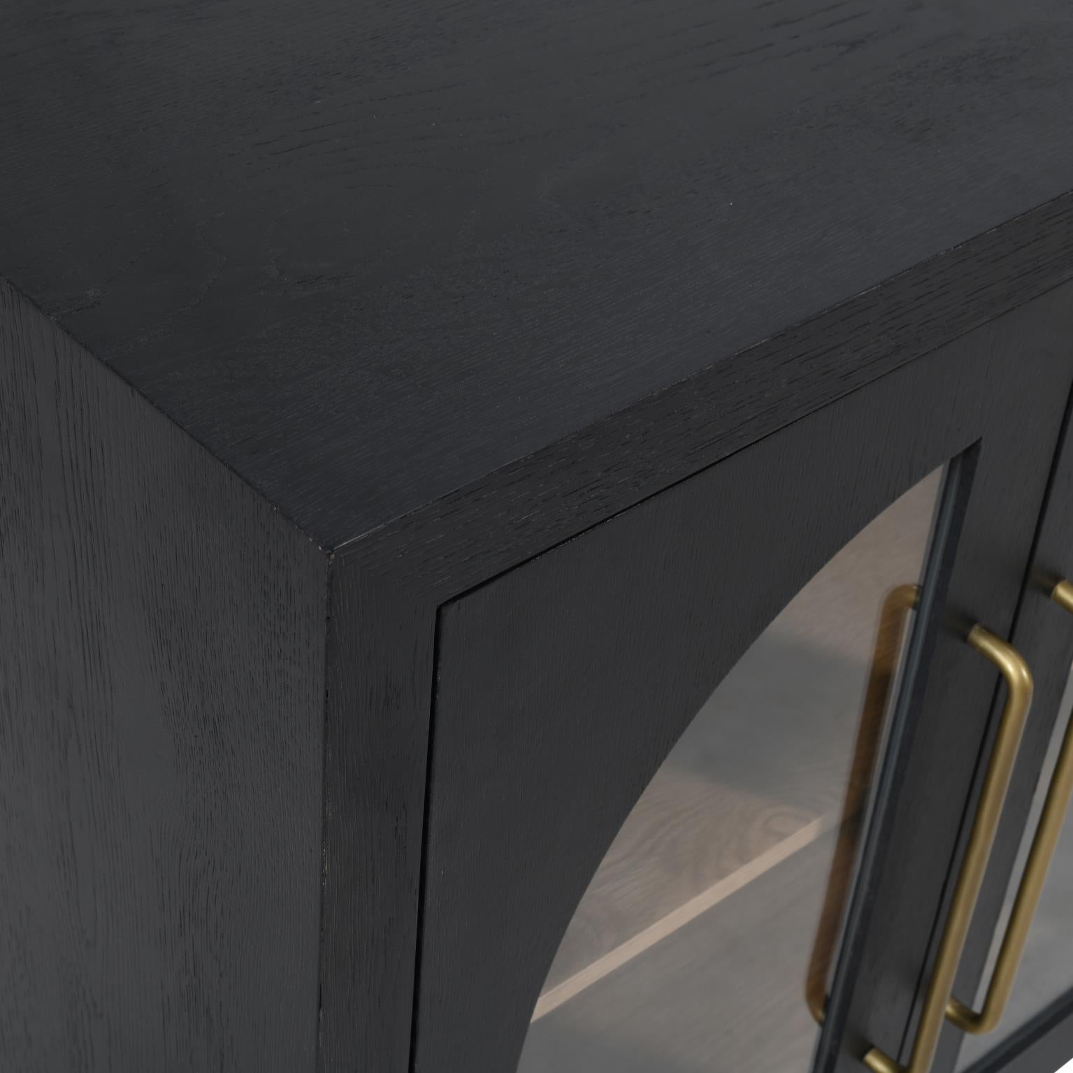Close-up shot focusing on the smooth ebony oak finish and the seamless architectural frame of the console