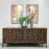 Lifestyle shot highlighting the sideboard styled with contemporary mirrors and organic accents in a high-end interior setting