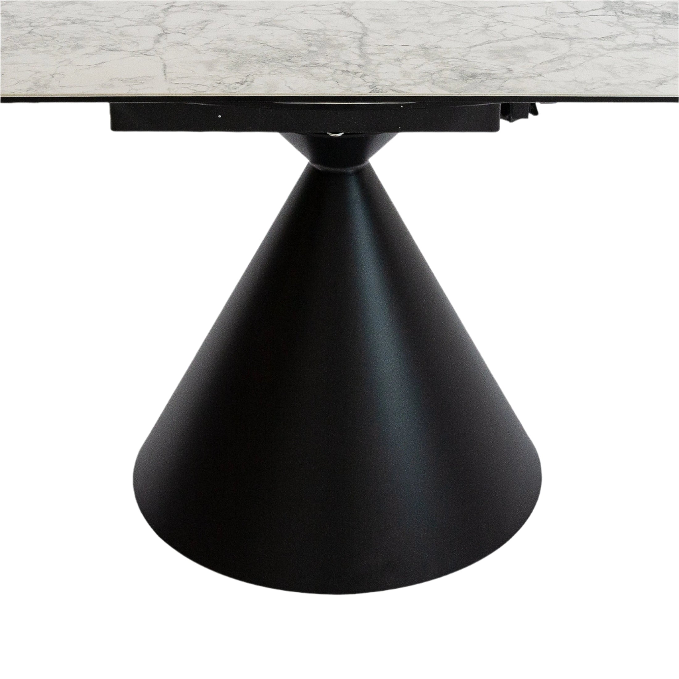 Three-quarter perspective view of the Elskede table shown in its extended oval configuration with the faux marble surface