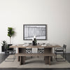 Lifestyle shot featuring the Konstantin table in a minimalist room styled with a matching wooden bench and black metal frame chairs