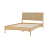 Three-quarter perspective view highlighting the clean architectural lines of the light oak frame and slim tapered legs