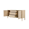 High-angle perspective view showcasing the continuous light oak grain across the top surface and slotted door fronts
