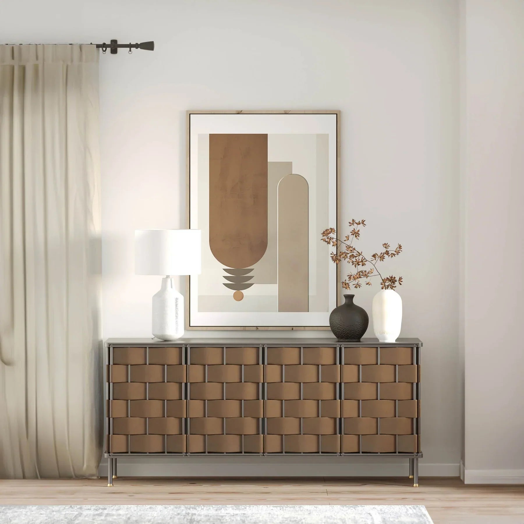 Front view of the Bishop sideboard featuring a hand-woven cognac brown leather panel design set within a slim dark metal frame