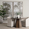Studio lifestyle shot featuring the dark Jovani table paired with two cream upholstered chairs in a minimalist dining room