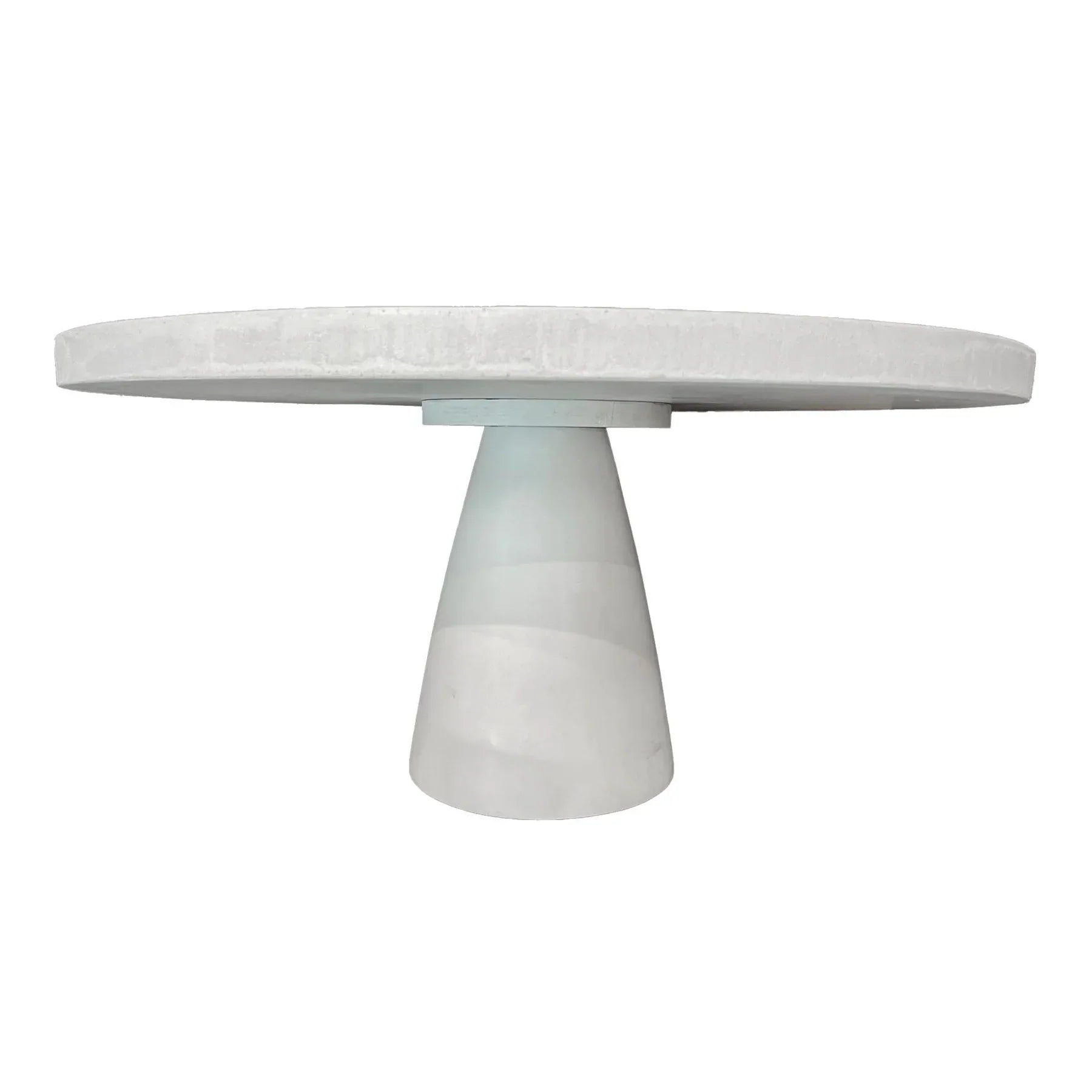 Front view of the Sculpture coffee table featuring a large circular top and a tapered conical pedestal base in a smooth white concrete finish