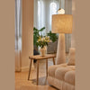 Lifestyle shot of the Juliet side table styled next to a cream sofa in a bright modern living space