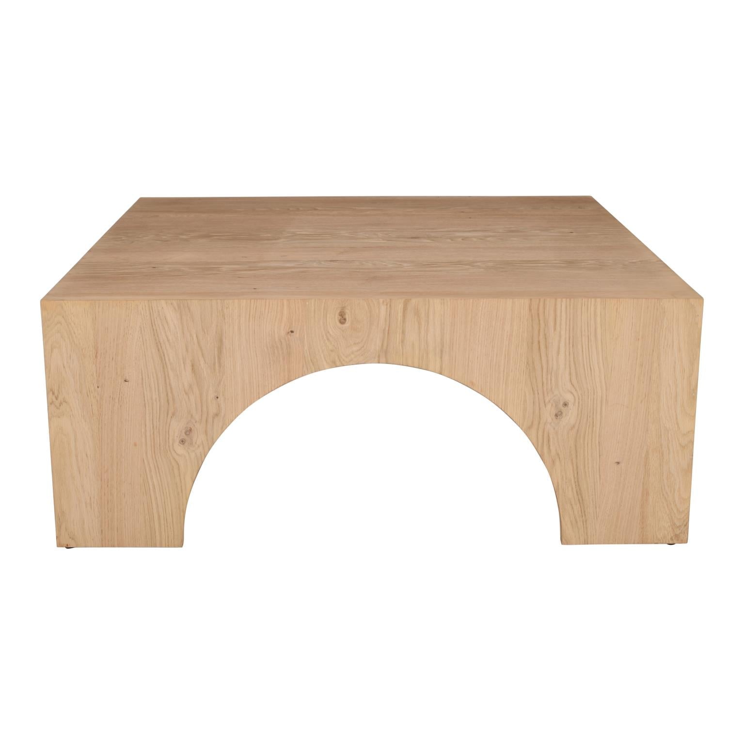 Straight-on front view showcasing the symmetrical arch design and solid wood block construction of the square coffee table