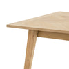 Perspective view focusing on the high-quality wood joinery where the tapered leg meets the rectangular tabletop frame