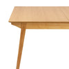 High-angle perspective view showcasing the table's footprint and the warm organic aesthetic of the natural oak wood