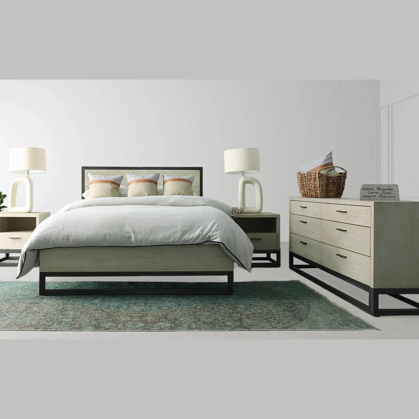 Final lifestyle perspective featuring the bed styled with sage green accents and a textured area rug