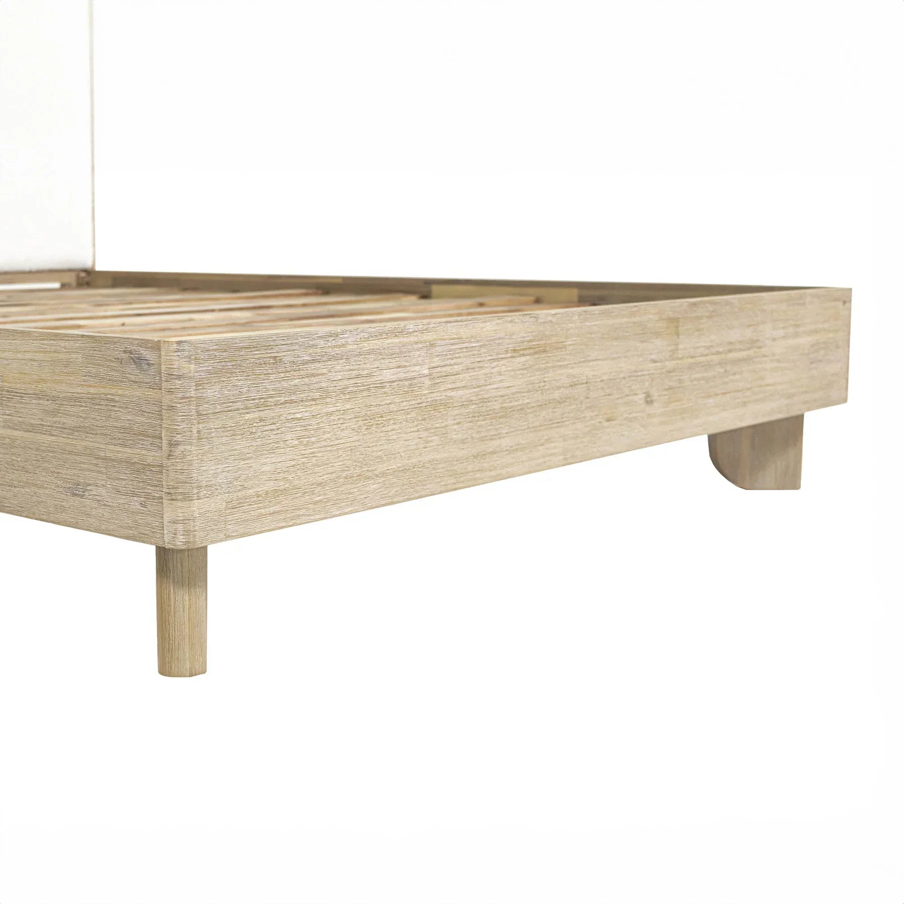 Front view of the Haru platform bed featuring a light driftwood frame and twin white bouclé upholstered headboard inserts