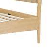 Alternate detail of the bed leg highlighting the secure attachment to the light oak frame