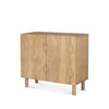 Three-quarter perspective view highlighting the clean minimalist silhouette and the sturdy cylindrical wood legs