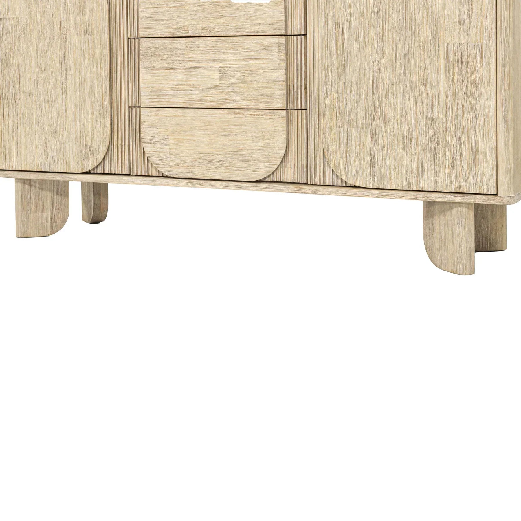 Front perspective view of the Haru sideboard in a light oak finish featuring unique rounded door and drawer panels with a minimalist plinth base