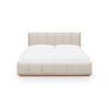 Straight-on view of the Bjorn bed styled with a white mattress highlighting the symmetrical vertical stitching and low-profile frame