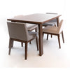 High-angle shot of the Bessa table styled with a set of four neutral and charcoal upholstered chairs