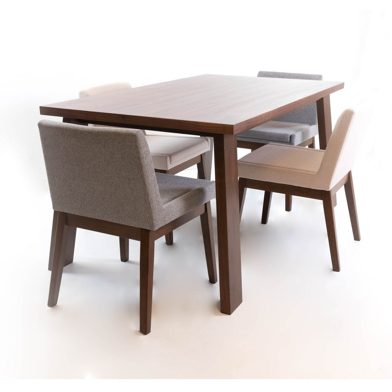High-angle shot of the Bessa table styled with a set of four neutral and charcoal upholstered chairs