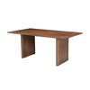 Three-quarter perspective view showcasing the solid wood construction and architectural slab base of the Dallas table