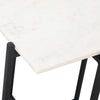 Close-up macro shot highlighting the natural grey veining of the white marble tabletop and the clean corner joint of the black metal base