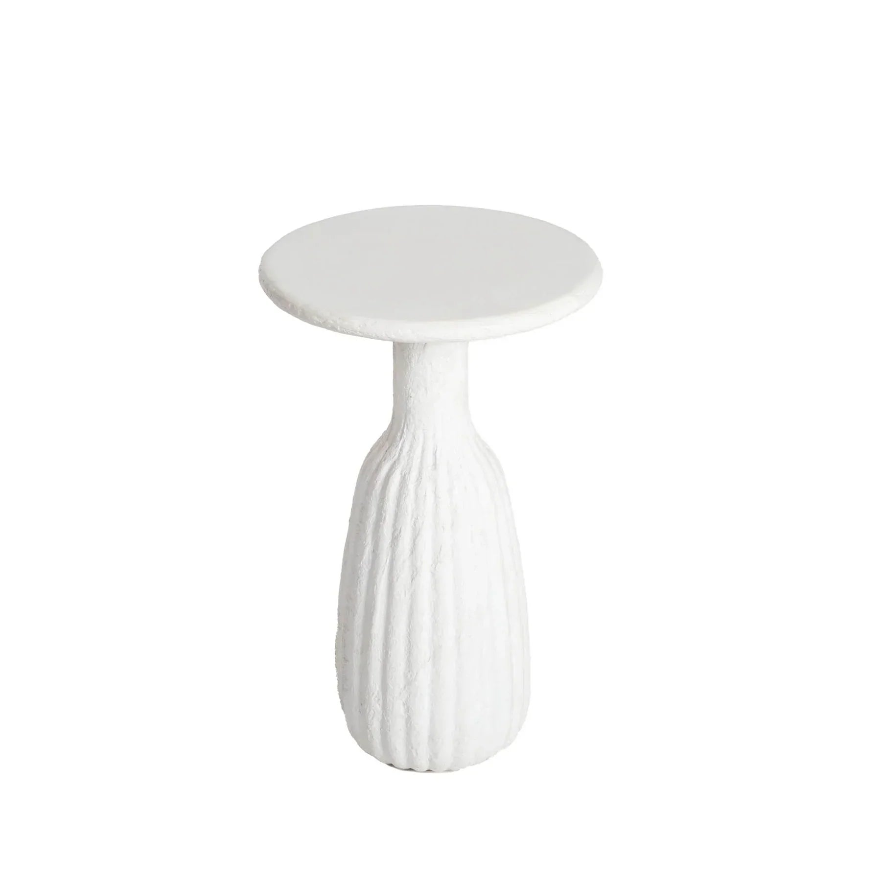 Front view of a white minimalist side table featuring a circular top and a unique fluted hourglass pedestal base with a textured plaster-like finish