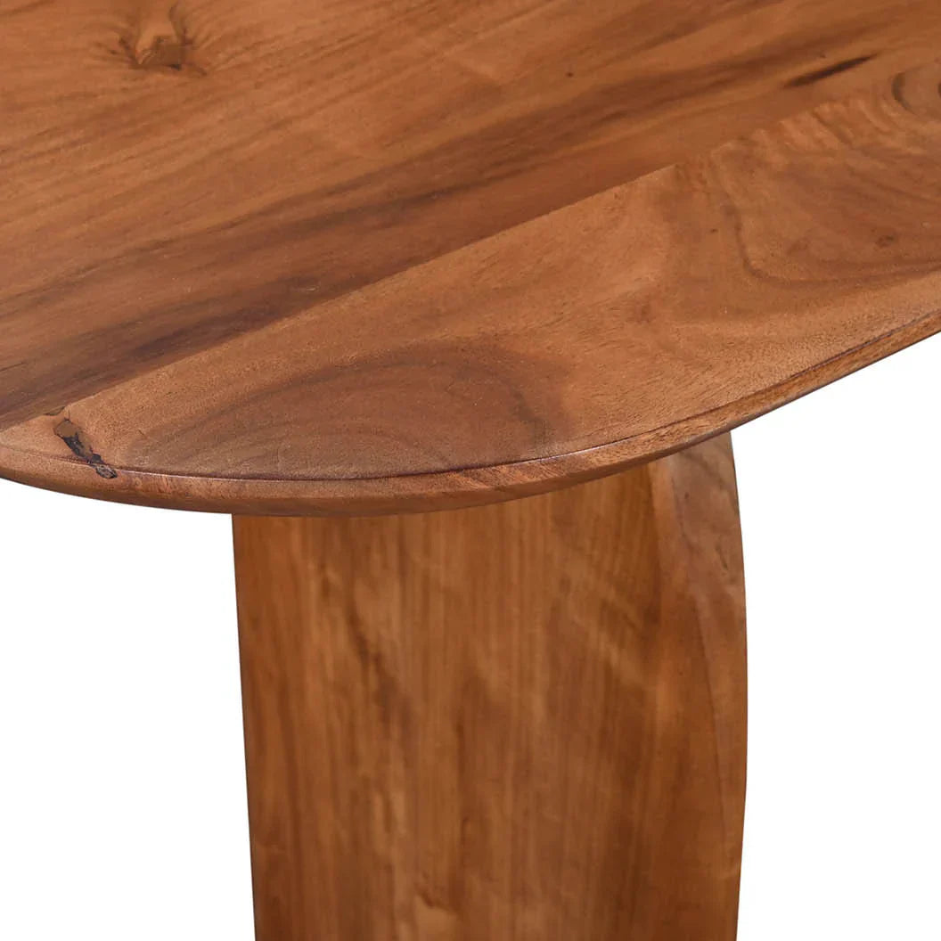 Close-up shot highlighting the seamless integration and high-quality joinery where the curved leg meets the tabletop