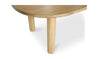 Close-up view highlighting the seamless joinery and sturdy cylindrical leg construction of the Milo table
