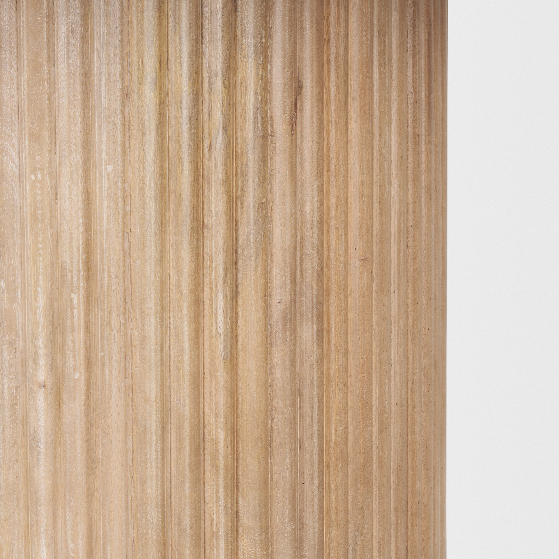 Front view of the 60 inch Terra round dining table featuring a light brown wood finish and a thick fluted cylindrical pedestal base