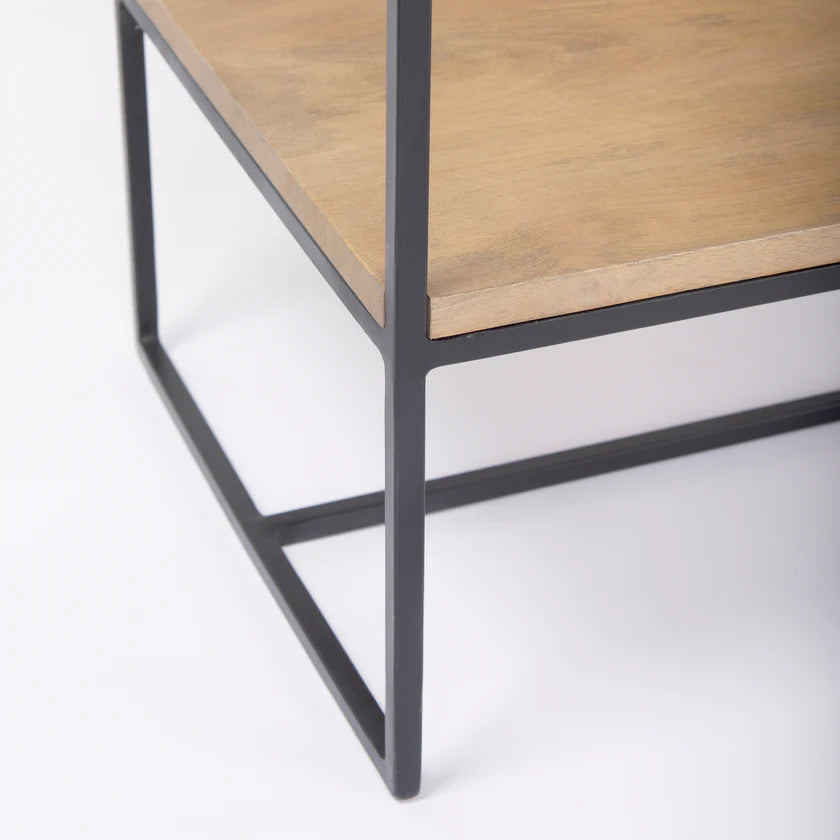 Perspective view of the Morris 6-tier shelving unit featuring a black metal frame and light brown wood shelves in an asymmetrical layout