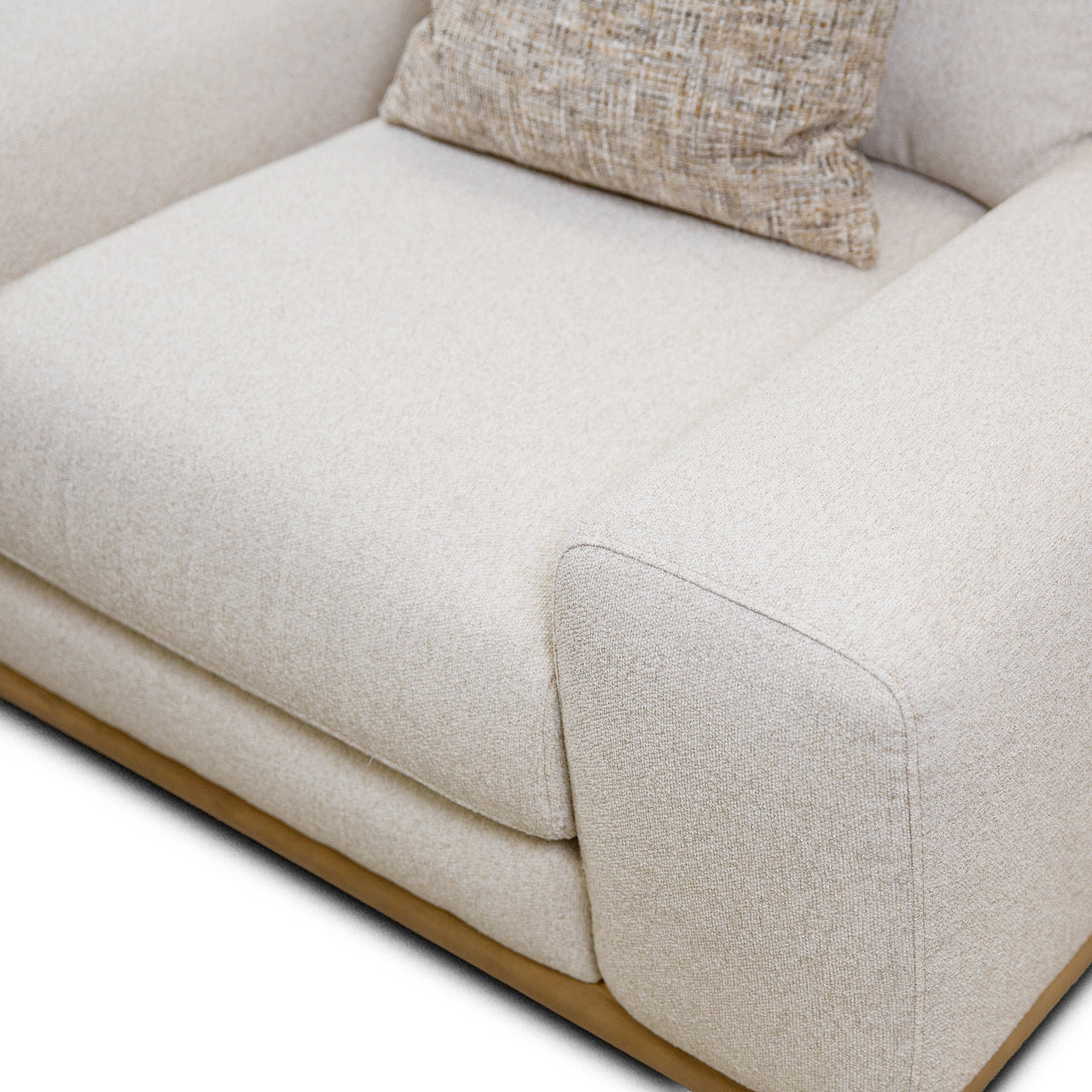 Front view of the Mylo Modern Accent Chair in cream bouclé featuring a low-profile silhouette and light oak wood base