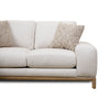 Close-up front view of the Mylo loveseat highlighting the plush seat cushions and wooden frame detail