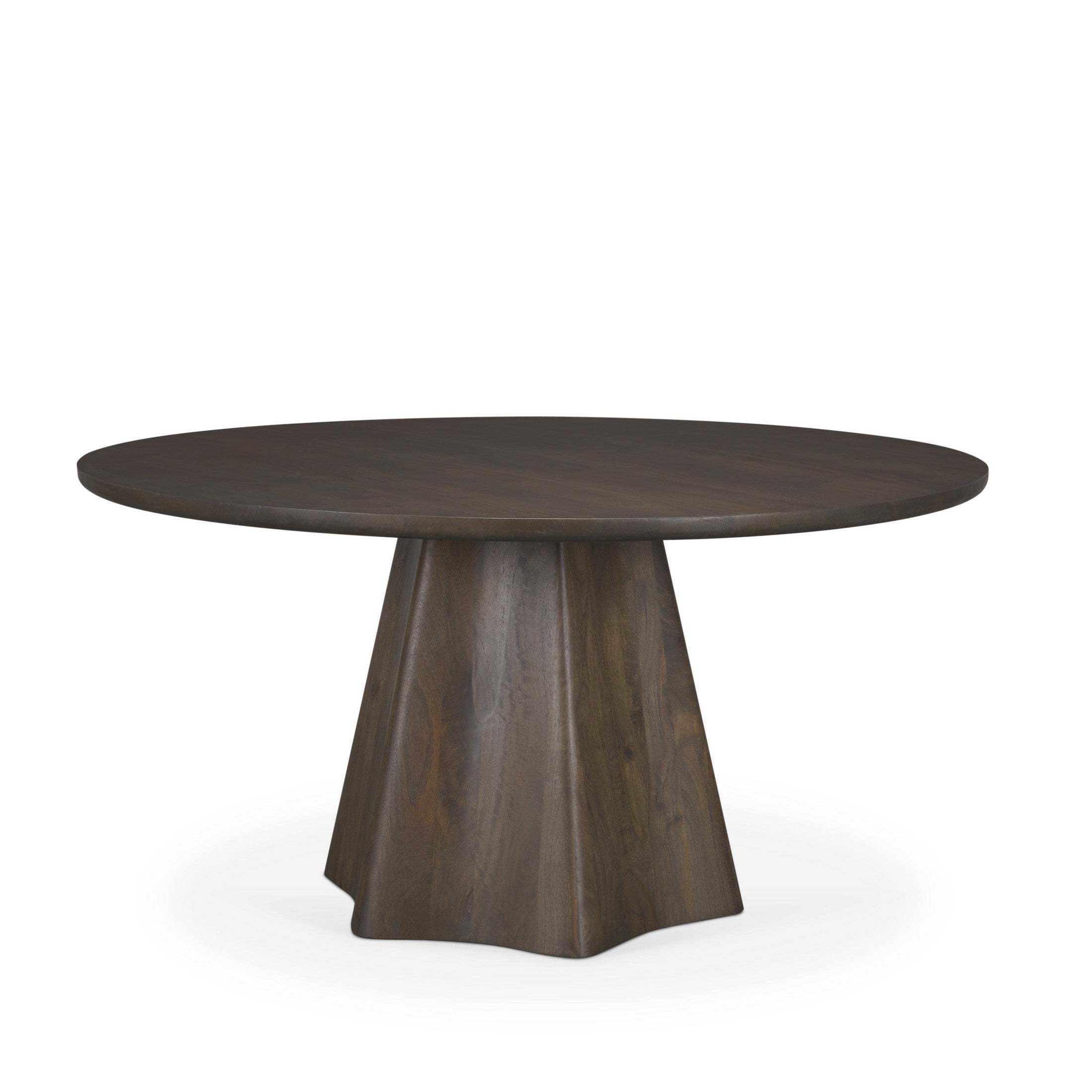 Front view of the Jovani round dining table in a dark mango wood finish featuring a sculptural faceted pedestal base