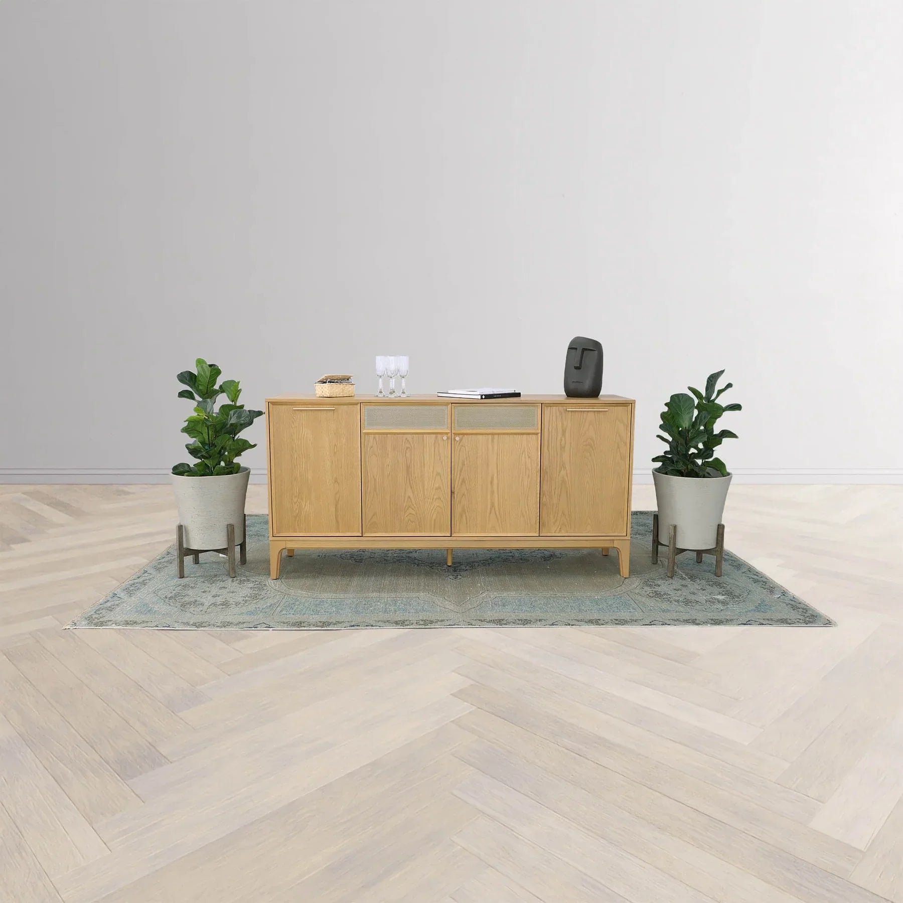 Three-quarter perspective view of the Arizona 4-door sideboard in a natural oak finish featuring two central metal mesh door inlays and tapered wood legs
