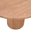Detailed close-up perspective of the cylindrical fluted base and the undersurface of the natural oak tabletop
