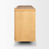 Side profile view of the natural oak sideboard showcasing the clean vertical lines and the wrap-around leg detail