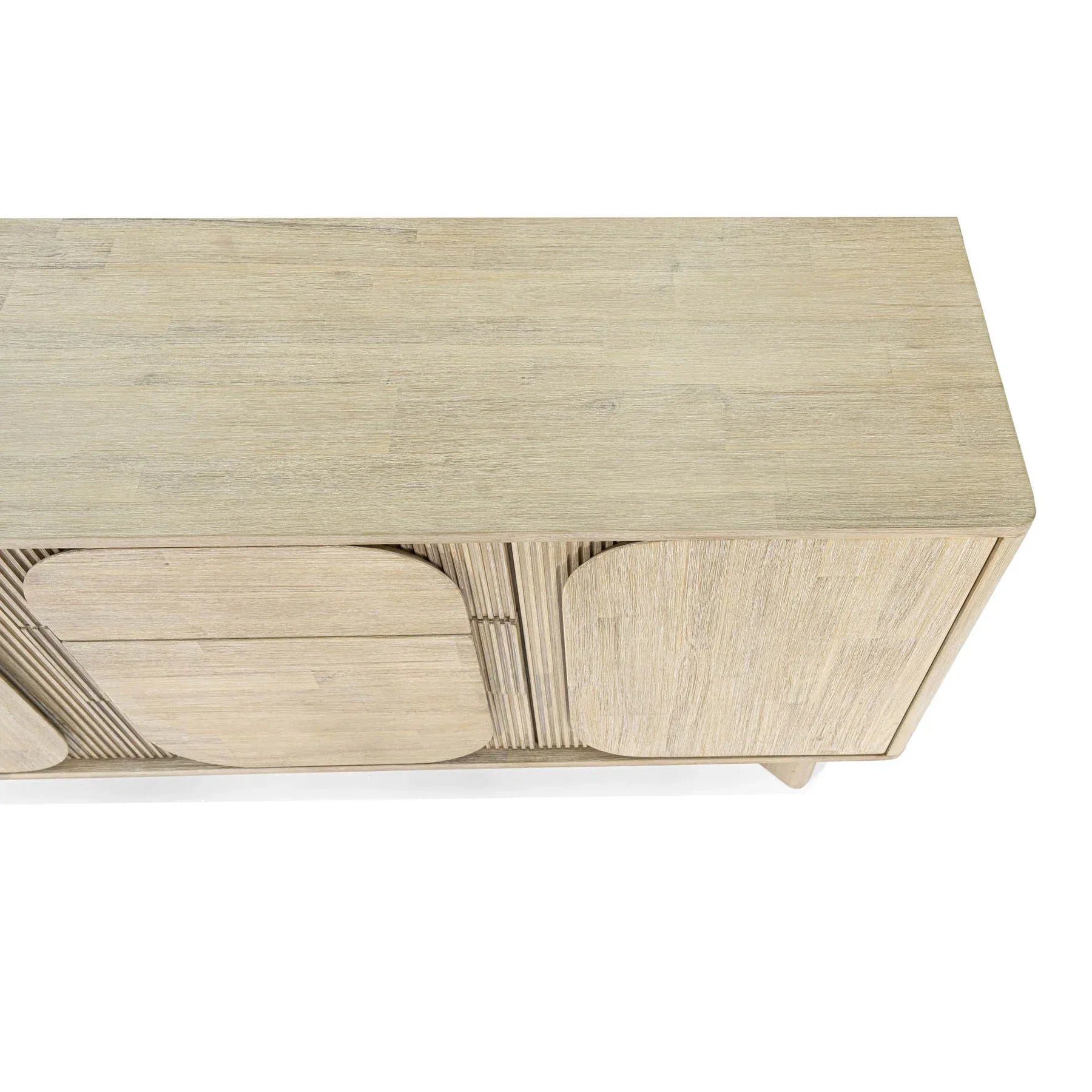 Front perspective view of the Haru sideboard in a light oak finish featuring unique rounded door and drawer panels with a minimalist plinth base